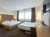 Четырёхместный номер Стандарт с балконом