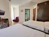 Трёхместный номер Deluxe