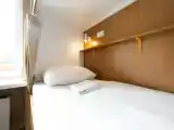 (женский номер) кровать в общем номере