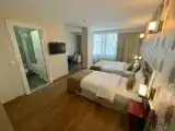 Трёхместный номер Deluxe