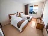 Трёхместный номер Deluxe с видом на море