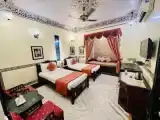 Трёхместный номер Deluxe с балконом