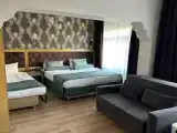 Трёхместный номер Deluxe