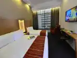 Трёхместный номер Deluxe