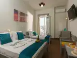 Трёхместный номер Стандарт с балконом