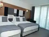 Трёхместный номер Deluxe King