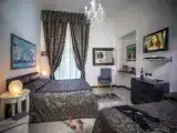 Четырёхместный номер Стандарт с балконом