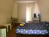 Четырёхместный номер Стандарт с балконом