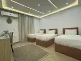 Трёхместный номер Deluxe