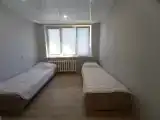 Четырёхместные апартаменты с балконом и с видом на город