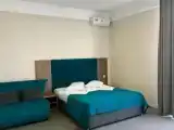 Четырёхместный номер Superior с балконом