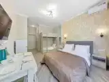 Четырёхместная студия с балконом