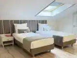 Трёхместный номер Deluxe