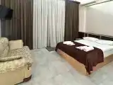 Трёхместный номер Deluxe