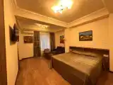 Трёхместный номер Deluxe с балконом