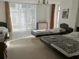 Четырёхместный номер Стандарт с балконом