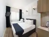 Трёхместный номер Deluxe