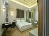 Трёхместный номер Deluxe