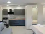 Четырёхместная студия с балконом и с красивым видом из окна