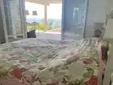 Вилла с балконом и с красивым видом из окна