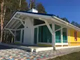 Четырёхместный семейный коттедж Стандарт с красивым видом из окна