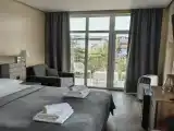 Люкс с 2 комнатами с балконом и с красивым видом из окна