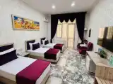 Трёхместный номер Deluxe