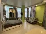 Студия с балконом и с красивым видом из окна