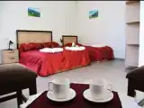 Трёхместный семейный номер Deluxe с балконом и с видом на горы