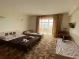 Четырёхместный номер Стандарт с балконом