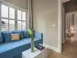 Трёхместный люкс с балконом и с видом на сад