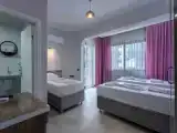 Трёхместный номер Стандарт с балконом