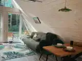 Треугольный дом Изумруд