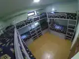 Кровать в общем номере с балконом