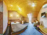 Четырёхместная студия Мансарда с балконом