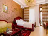 Трёхместный семейный номер Deluxe с балконом и с красивым видом из окна