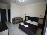 Четырёхместный номер Стандарт с балконом и с видом на горы