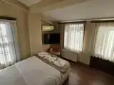 Трёхместный номер Deluxe с балконом и с видом на город