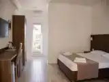 Трёхместный номер Deluxe с балконом