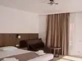 Трёхместный номер Deluxe с балконом и с видом на море