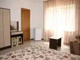 Четырёхместный номер Стандарт с балконом