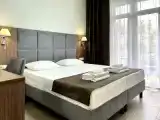 Четырёхместные апартаменты с 2 комнатами с балконом и рядом с пляжем