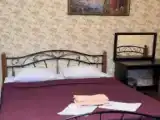 Четырёхместный номер Стандарт с балконом и с красивым видом из окна