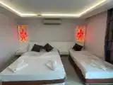 Трёхместный номер Deluxe с видом на море