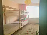 Кровать в общем номере (женский номер) с балконом