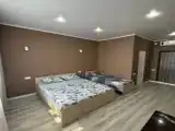 Четырёхместный люкс с балконом и с частичным видом на море