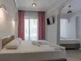 Четырёхместный номер Стандарт с балконом