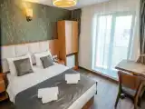 Трёхместный номер Deluxe