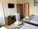 Четырёхместный номер Стандарт с балконом и с красивым видом из окна