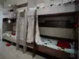 Кровать в общем номере (женский номер) с видом на город